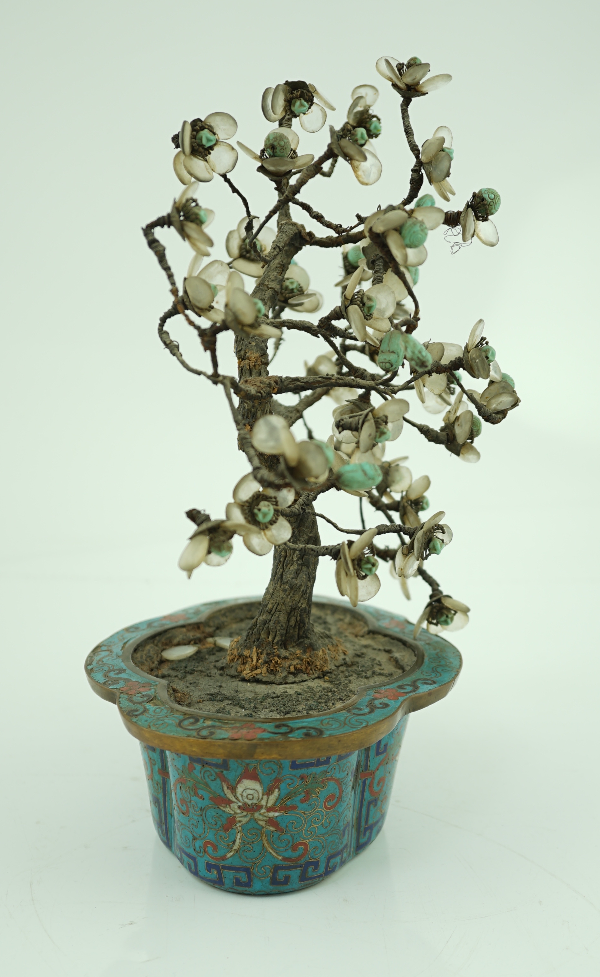 A Chinese cloisonné enamel jardiniere housing a glass mounted model tree, 19th century